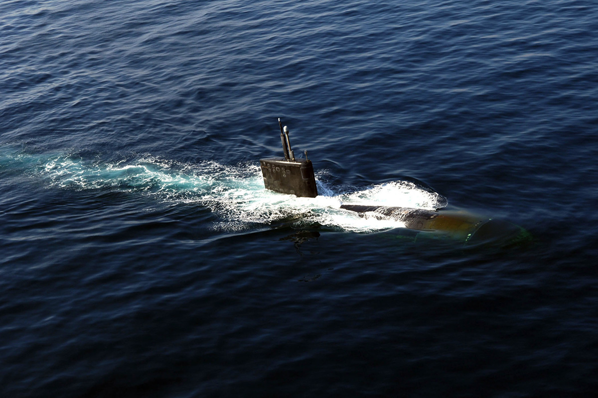 The submarine USS Miami (SSN 755) surfaces in the North Arabian Sea during an exercise. (Credit: U.S. Navy/Petty Officer 1st Class Joshua Scott)