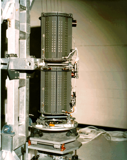 Image of a tall, cylindrically shaped radioisotope thermoelectric generator