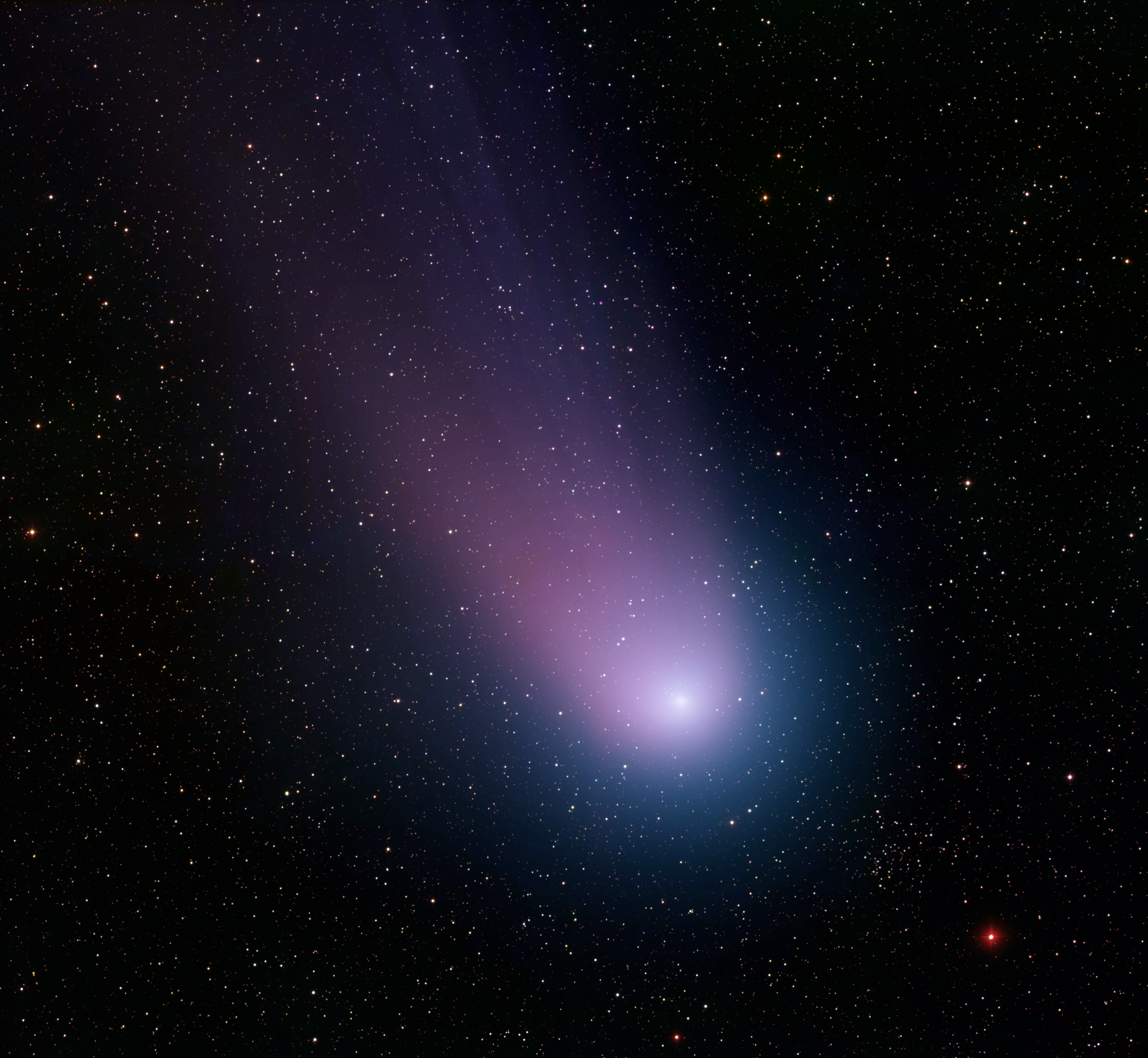 Image of a comet with a purple tail flying through space