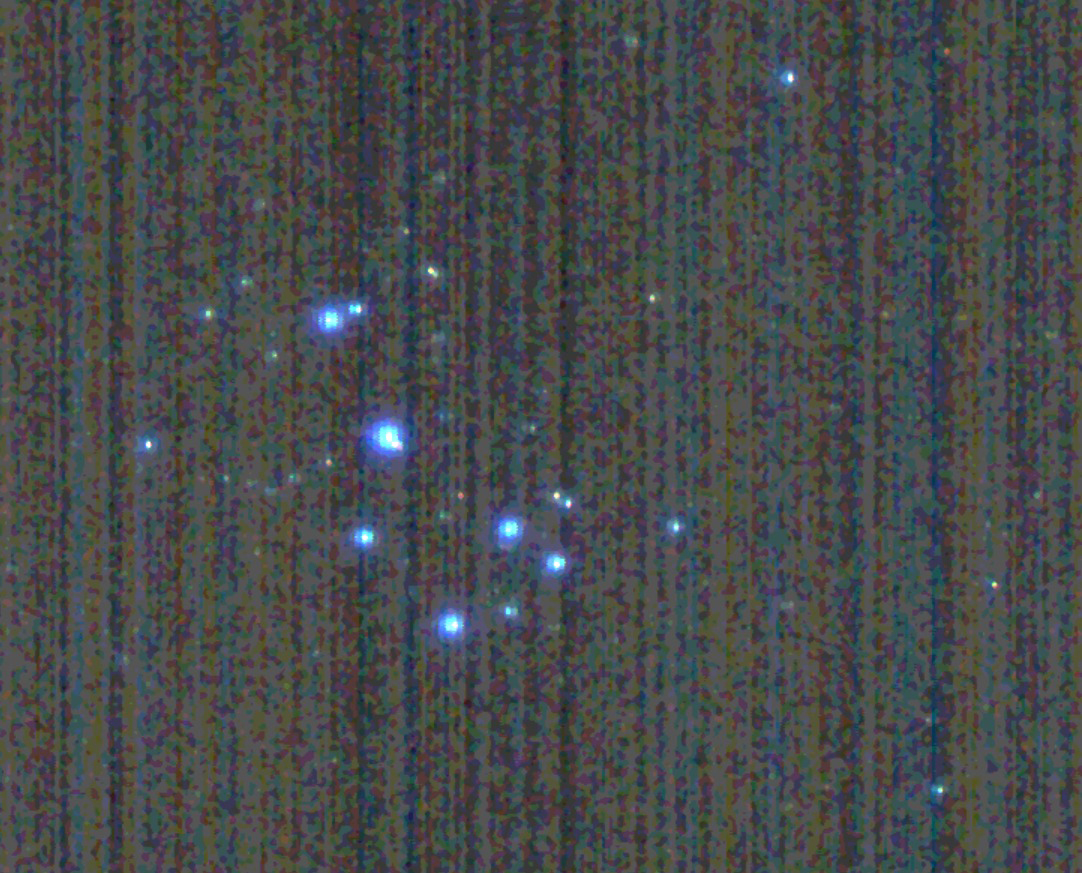 An image from outer space of the Pleiades star cluster