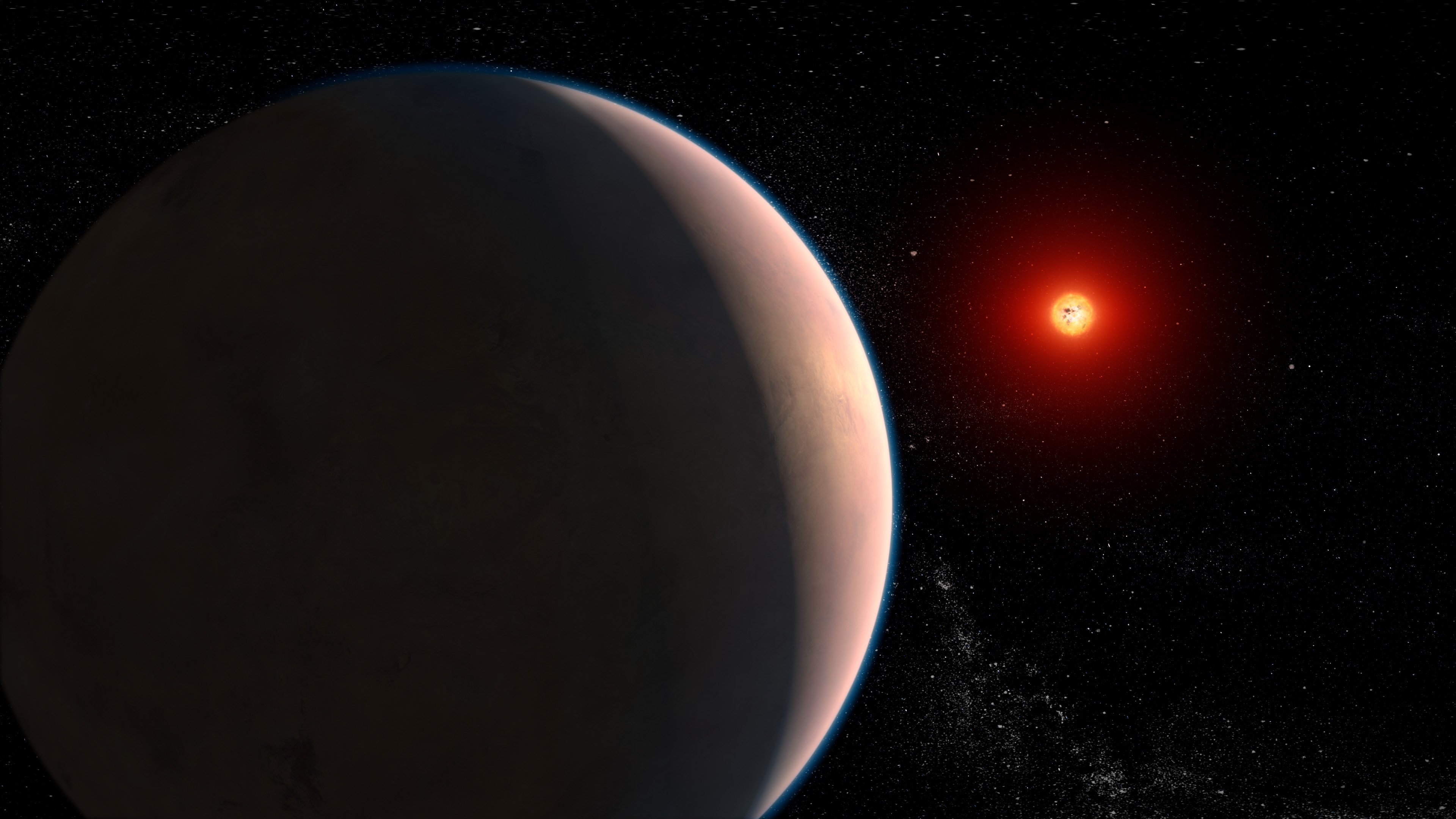 The faint glow of a red star in the distance illuminates the surface of a planet. The viewer sees just a warm crescent of the planet's surface.
