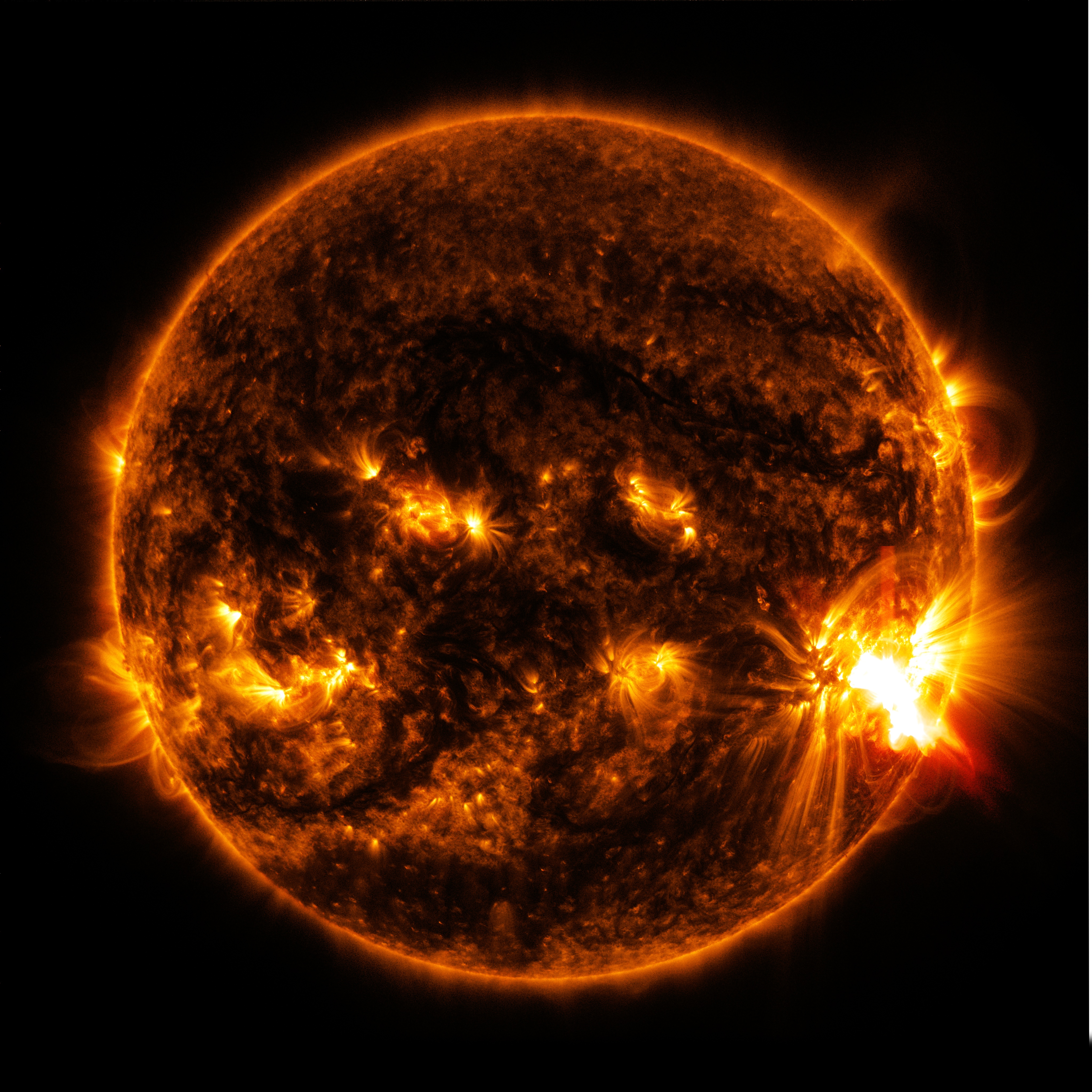 An image of the Sun, emphasizing bright spots where light and energy are being emitted