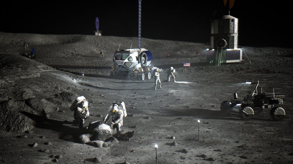 An illustration shows astronauts on the lunar surface, with two examining a rock, a rover with its lights on, a lander in the background, and two other astronauts examining the ground with flashlights