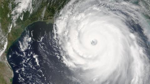 Satellite image of a hurricane over water near a coastline