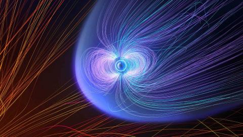 Blue and red magnetic field lines surrounding a planet