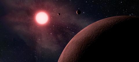 Illustration of three exoplanets orbiting a red star (NASA/JPL-Caltech)