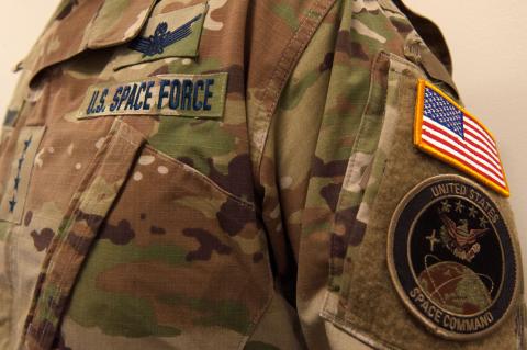 Image of a person wearing a camouflage uniform and the Space Force patch