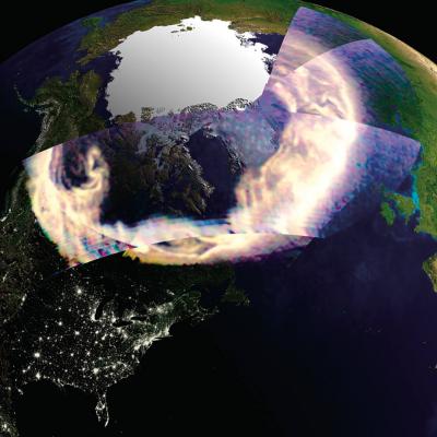 Composite of the aurora, as seen by GUVI, superimposed over an image of Earth